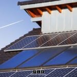 Solar panels on a roof installed by Wells Solar.
